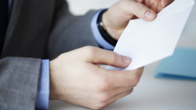 close up of businessman taking money bribe