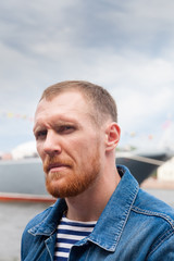  man with  beard in  sailor suit