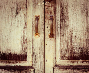 Old painted door with handles