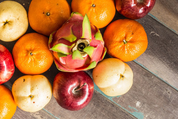 Many fruits on wooden