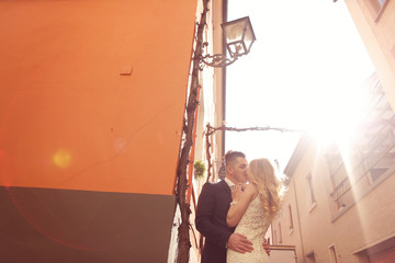 Bride and groom in the sunlight