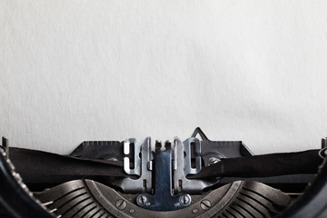 typewriter with paper sheet. Space for your text