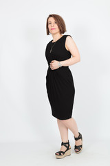 Beautiful woman doing different expressions in different sets of clothes: posing