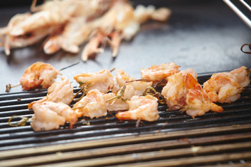 Shrimp on skewers on the grill