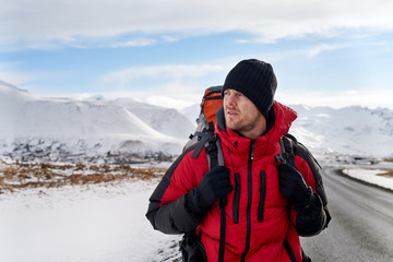 Fototapeta na wymiar Hitchhiking backpacker in iceland