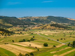 Fototapeta na wymiar Landscape of Slovenian Green Karst in summer