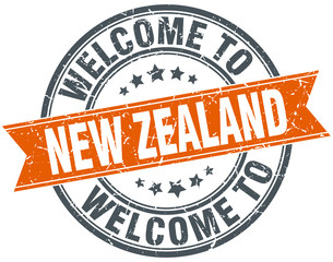 welcome to New Zealand orange round ribbon stamp