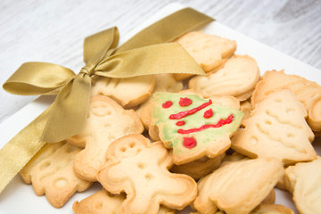 Christmas cookies with a golden ribbon