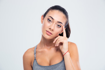 Portrait of a serious fitness woman looking at camera