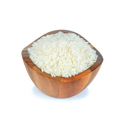 basmati rice in a wooden bowl isolated on white background