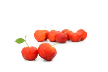 West Indian Cherries with leaf isolate on white background