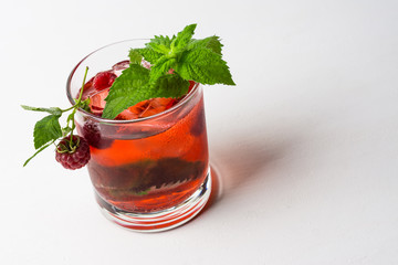 Cocktail with raspberry and mint