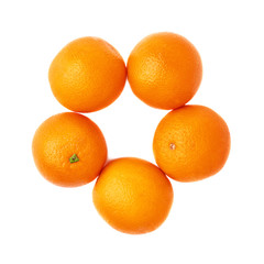 Multiple ripe oranges aligned in a circle round frame, isolated