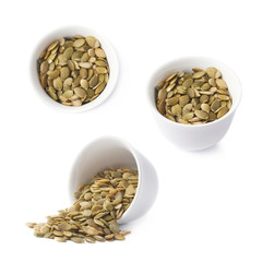 White cup filled with pumpkin seeds