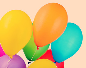 Color balloons on color background