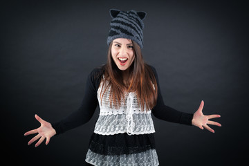 Beautiful woman doing different expressions in different sets of clothes: angry