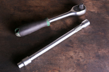 Socket spanner on table close up