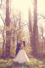 Bride and groom in a beautiful forest