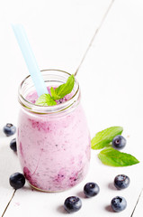 Blueberry shake on white table