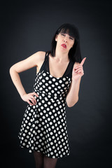 Fototapeta premium Beautiful woman doing different expressions in different sets of clothes: drunk