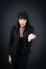 Beautiful woman doing different expressions in different sets of clothes: be careful