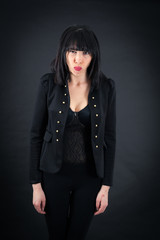 Beautiful woman doing different expressions in different sets of clothes: surprise