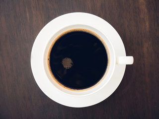 Black coffee in a cup, vintage (retro) style color effect