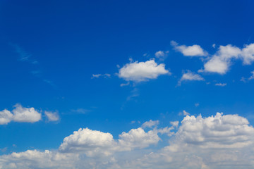 Naklejka na ściany i meble white fluffy clouds with beautiful blue sky