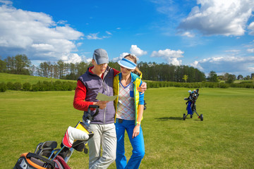Man and woman at golf