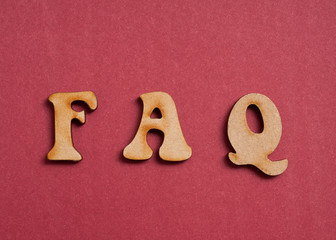 FAQ wooden letters.