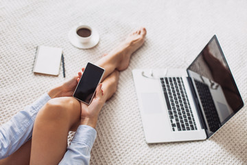 Young woman using smart phone