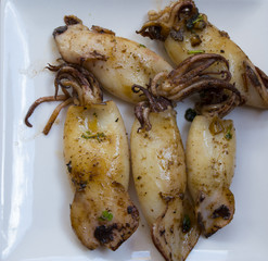 Squid with garlic and peregil