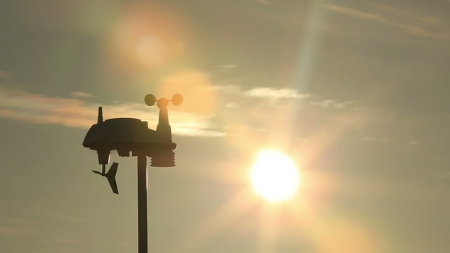 The anemometer in the sun's rays measures the wind speed.