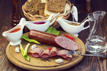 sausage on a wooden plate in a restaurant