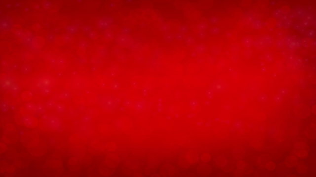 Animation of defocused flowing light dots on red background. Christmas background