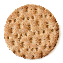 Single rye crispbread from above isolated on white.