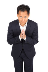 Handsome man doing different expressions in different sets of clothes: praying