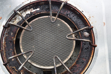 Obraz na płótnie Canvas Dirty gas burner closeup