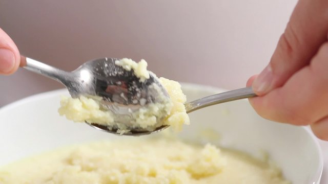 Sweet semolina dumplings being made