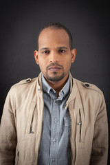 Obraz premium Handsome man doing different expressions in different sets of clothes: angry