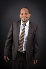 Handsome man doing different expressions in different sets of clothes: smile