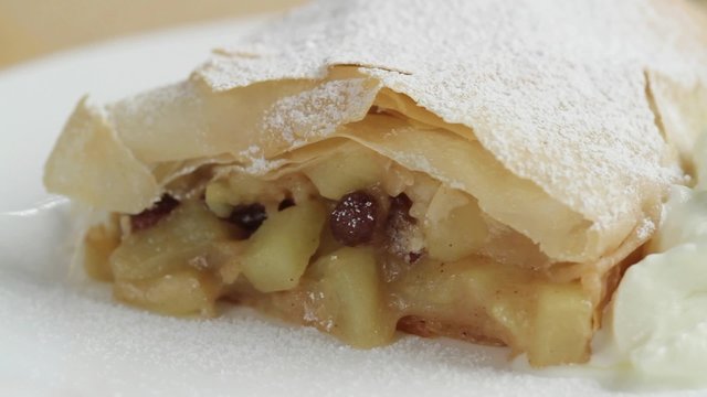 Apple strudel with cream