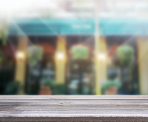 Table Top And Blur Building Background