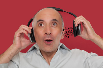 Man listening to music on headphones.