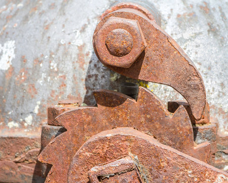 trinquete en manivela oxidada