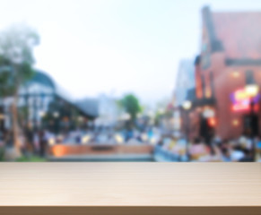 Fototapeta premium Table Top And Blur Building Background