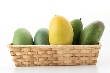 green and yellow mango on white background
