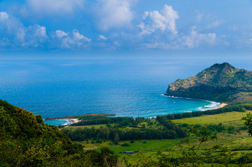 Fototapeta premium Aerial view overlooking the tropical island of Kauai and the Pac