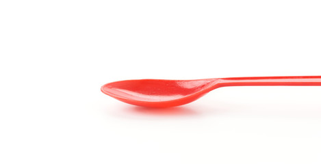 plastic spoon on white background