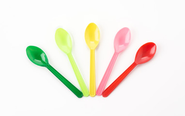 plastic spoon on white background